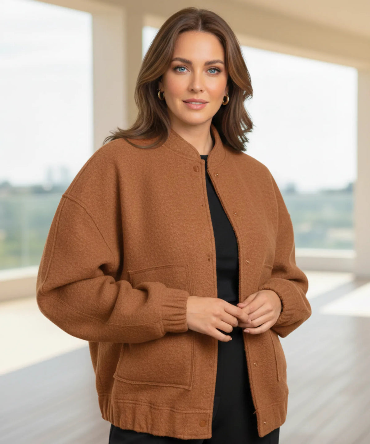 Women's oversized bouclé bomber jacket in nude, back view