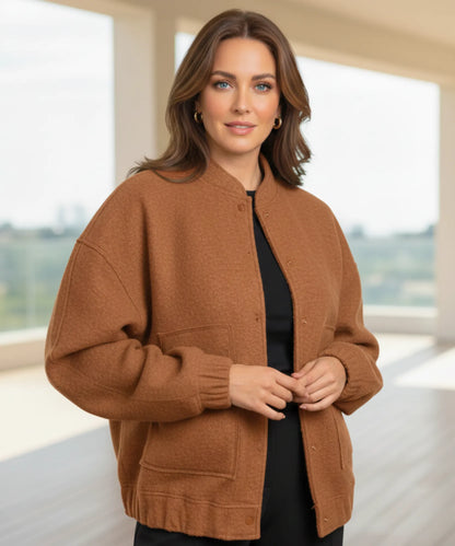 Women's oversized bouclé bomber jacket in nude, back view