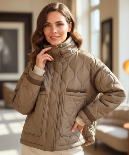 Women's oversized puffer jacket in olive green with geometric quilted stitching