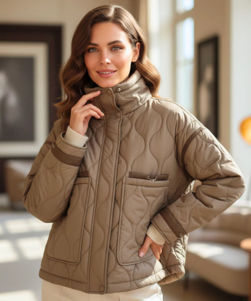 Women's oversized puffer jacket in olive green with geometric quilted stitching