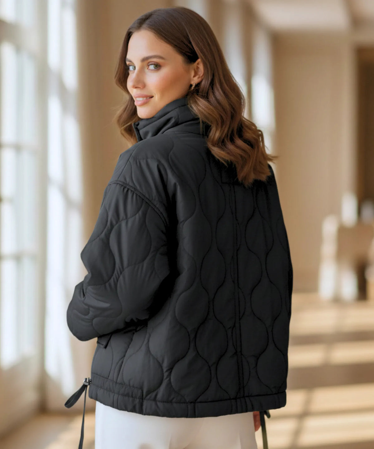 Women's quilted puffer jacket with high collar and front zip