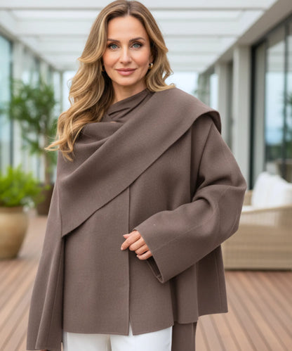 Elara wrap coat in taupe showing oversized sleeves and natural drape