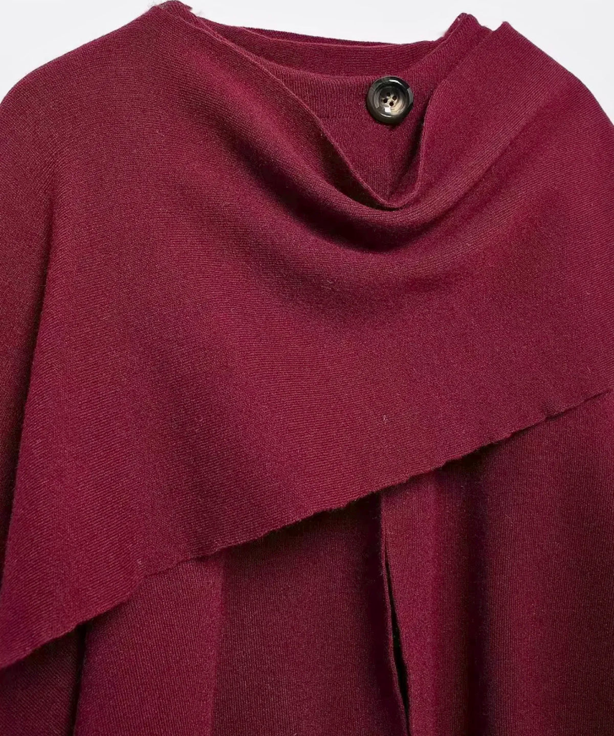 Close-up of velvety wool finish on women's wrap coat in taupe