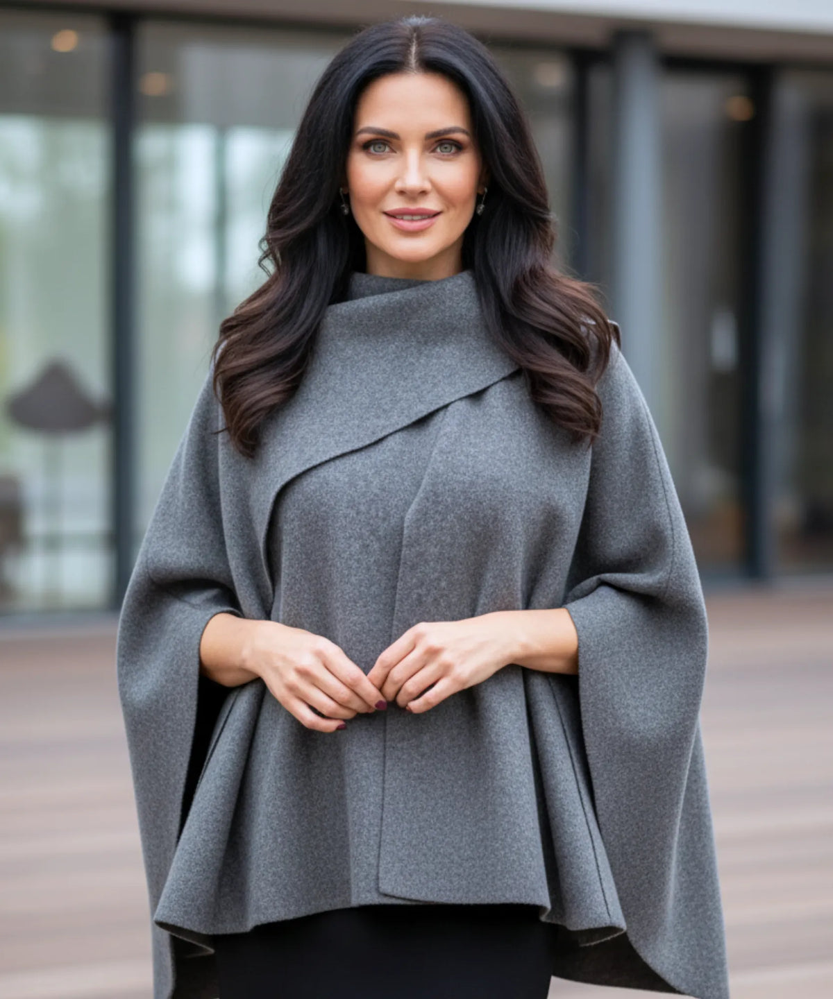 Side view of Elara wool wrap coat showing midi length silhouette