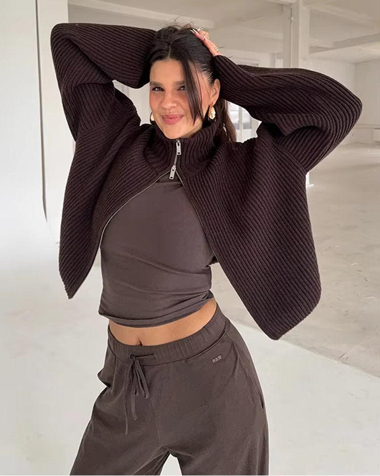 Women's warm turtleneck sweater styled with jeans, casual autumn outfit