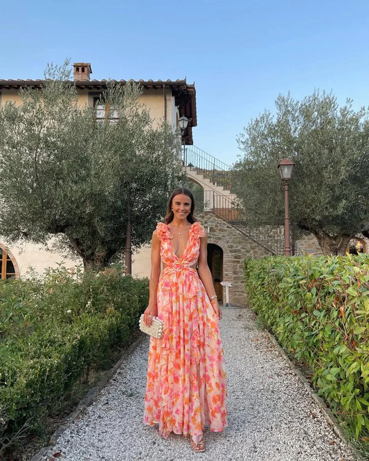 Women's sleeveless floral maxi dress in orange with cut-out detail