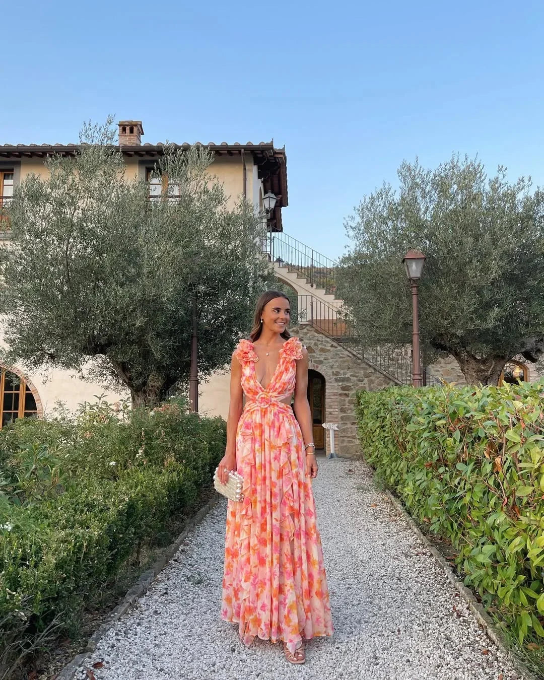 Floral maxi dress in pink for wedding guests and special occasions