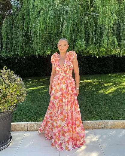 Back view of sleeveless floral maxi dress with flattering silhouette