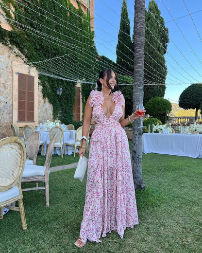 Pink floral maxi dress showcasing feminine silhouette and fit