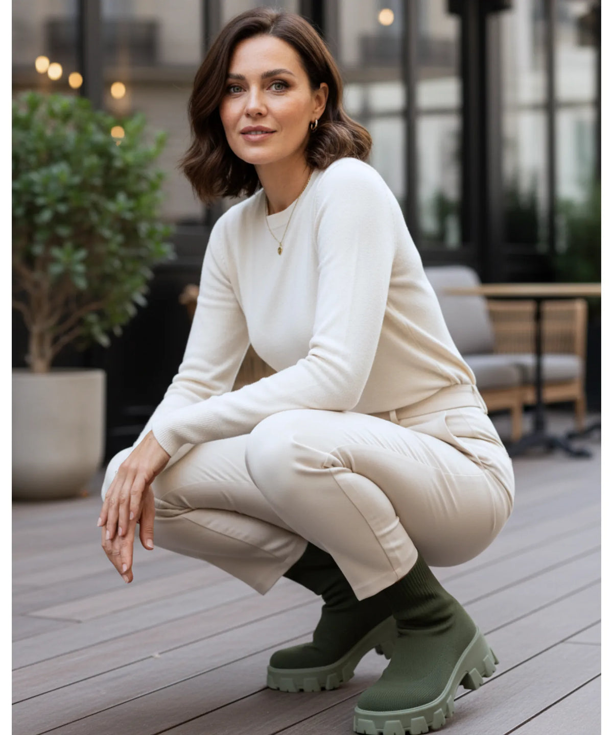 Women's army green knit sock boot with rounded toe and lug sole