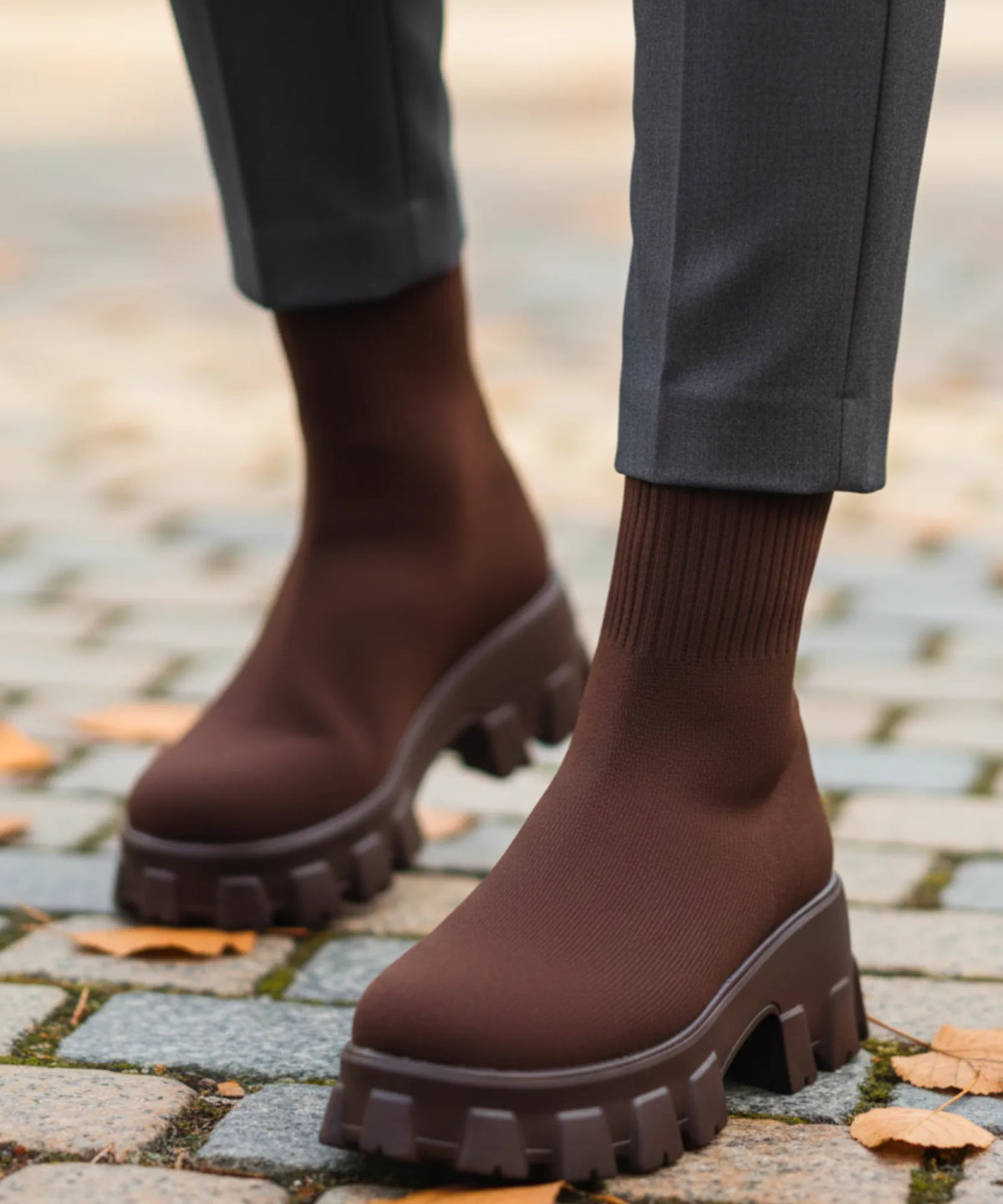 Overhead flat lay of 5 colourways of women's stretch knit lug sole boot