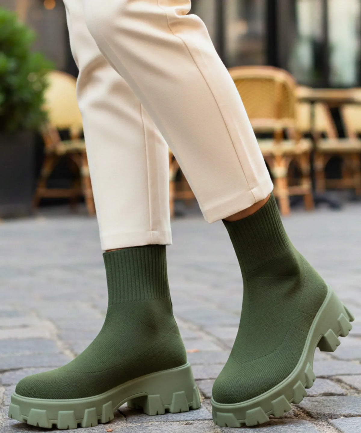 Women's knit sock boot mid-calf fit showing form-fitting stretch upper