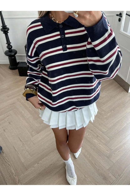 Close-up of polo neckline and stripe detail on women's knit jumper