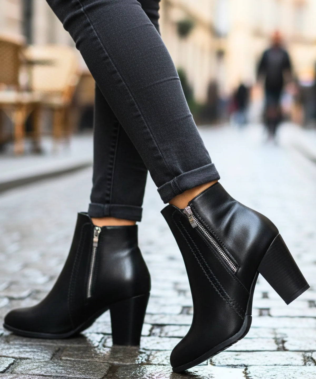 Close-up of polished zipper pull on Serena women's leather ankle boots