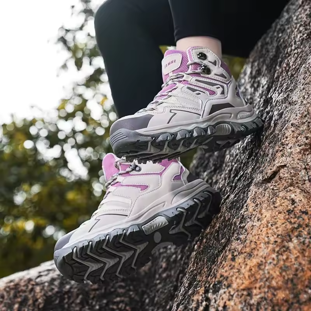 Women wearing Venza waterproof hiking shoes on rocky trail