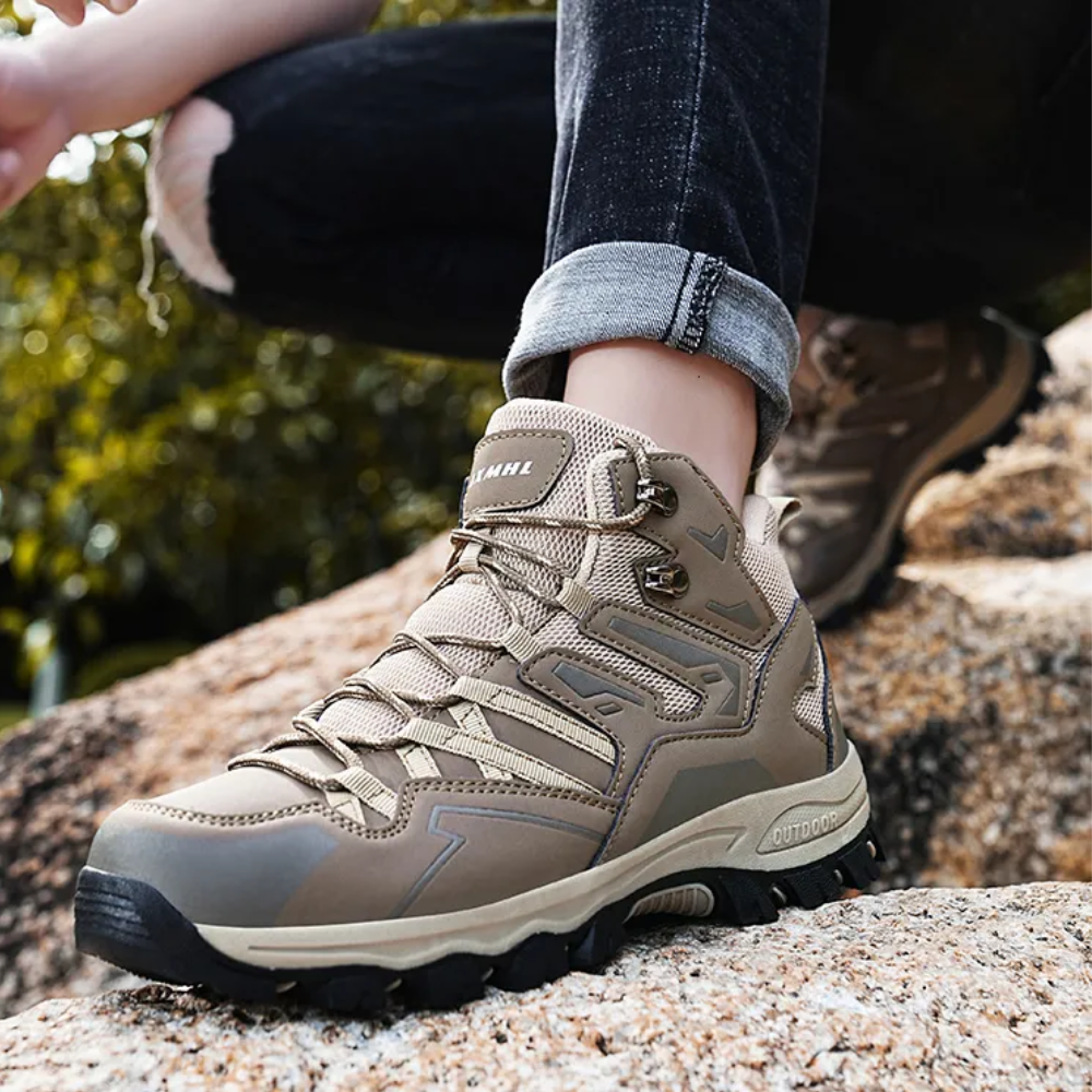 Venza waterproof trekking shoes on muddy outdoor path