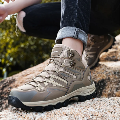 Venza waterproof trekking shoes on muddy outdoor path
