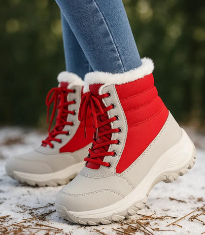 Navy blue quilted snow boots for women with non-slip rubber outsole
