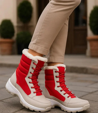 Women's navy mid-calf winter boots with thermal lining and lace-up front