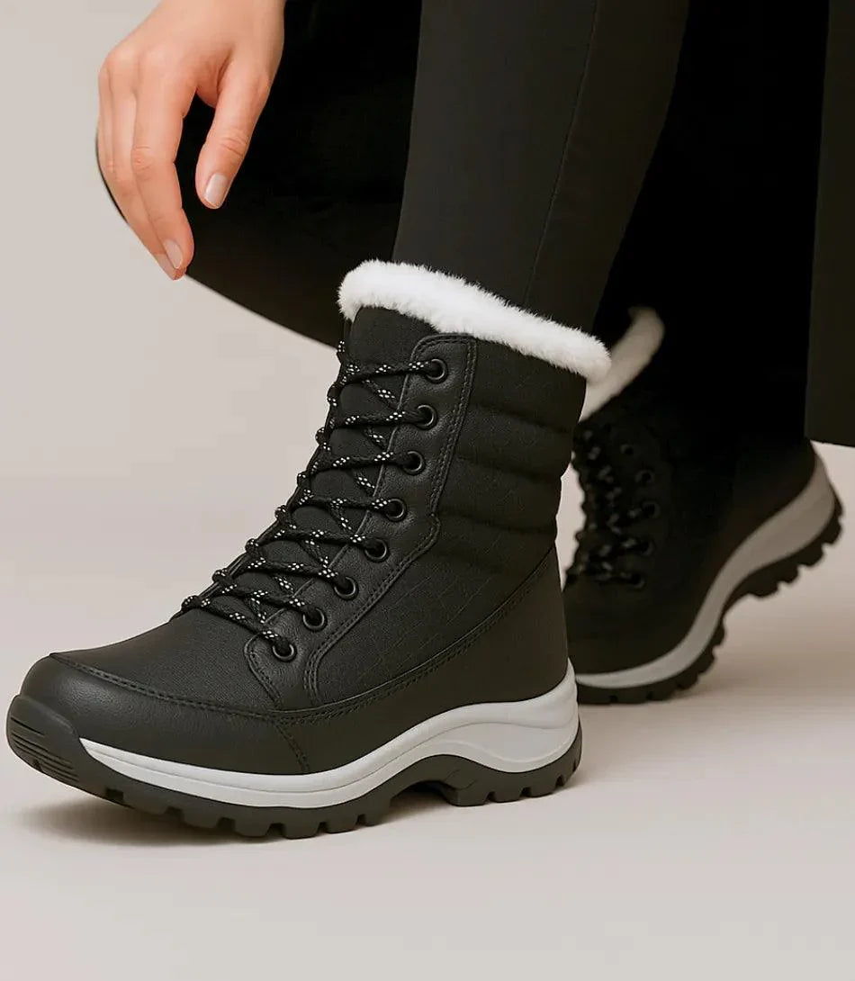 Women's waterproof snow boots in red with fur trim and quilted shaft