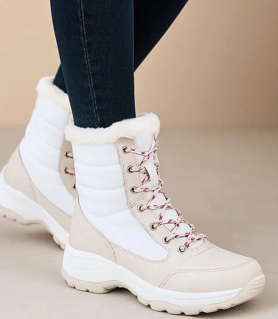 Black waterproof winter boots for women with thermal lining and mid-calf shaft
