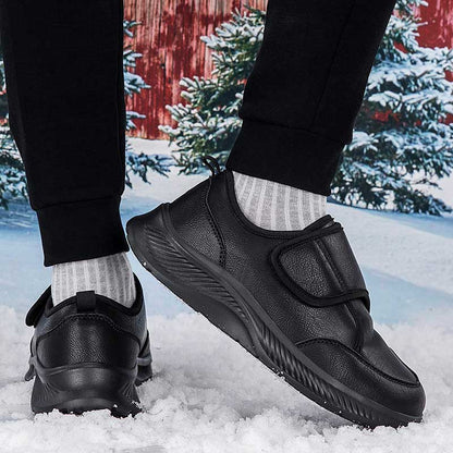 Top-down view of black velcro winter nursing sneaker